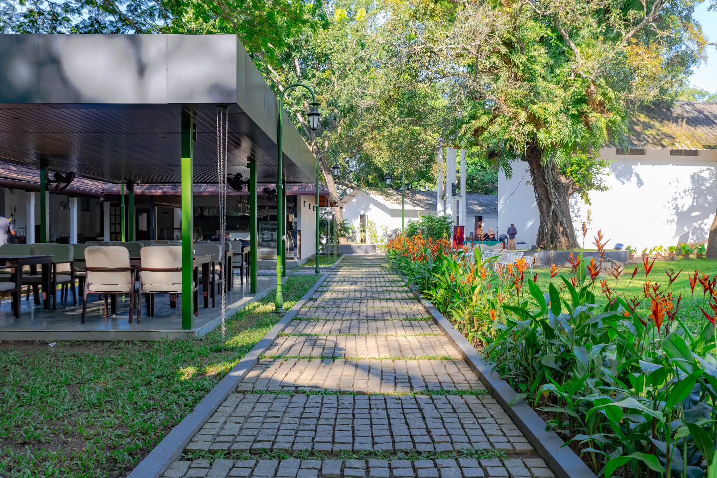 A cooking class in progress with participants learning to make Kerala dishes.